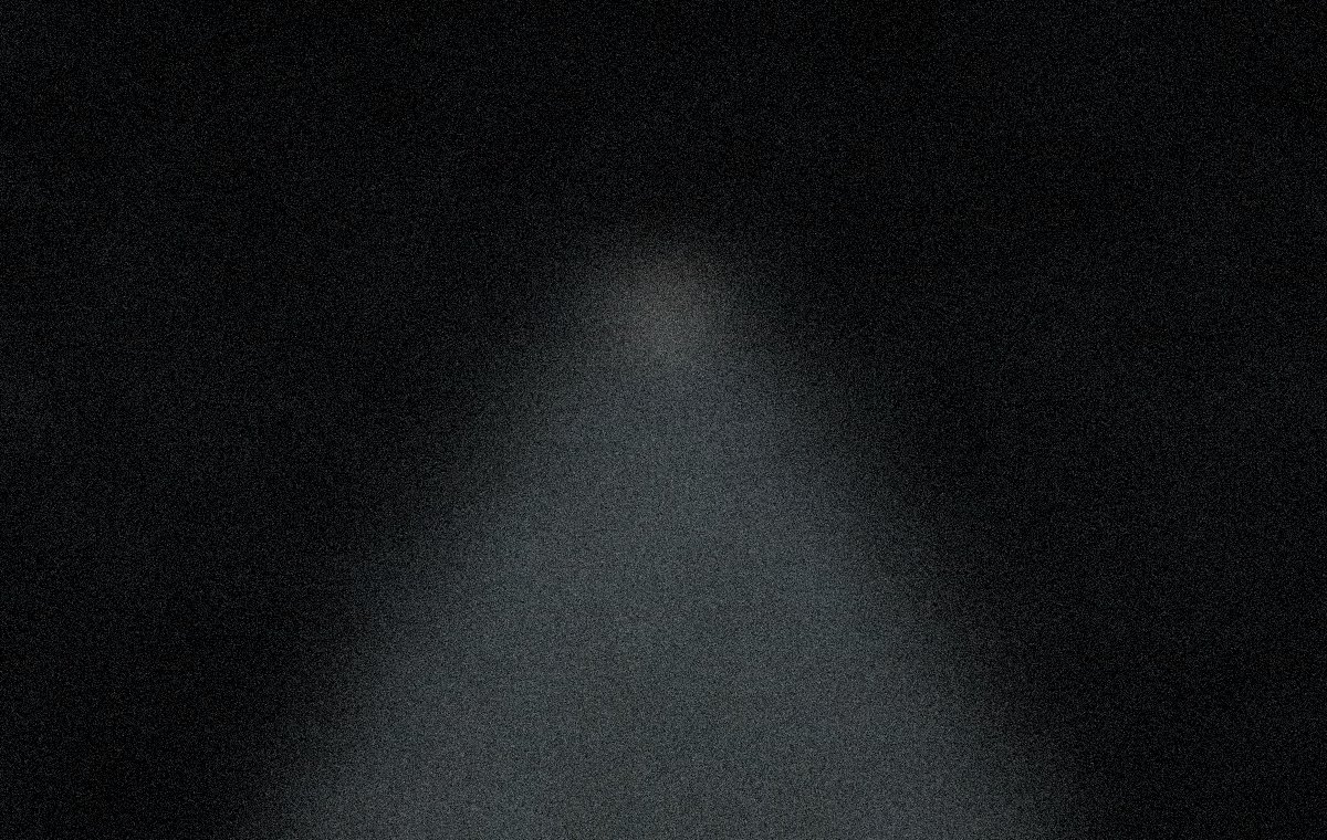 A corridor lit from one end.