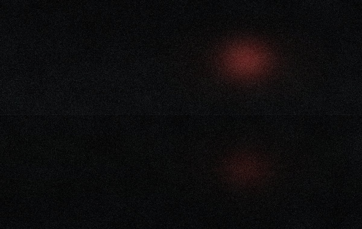 Standing water under a red light.
